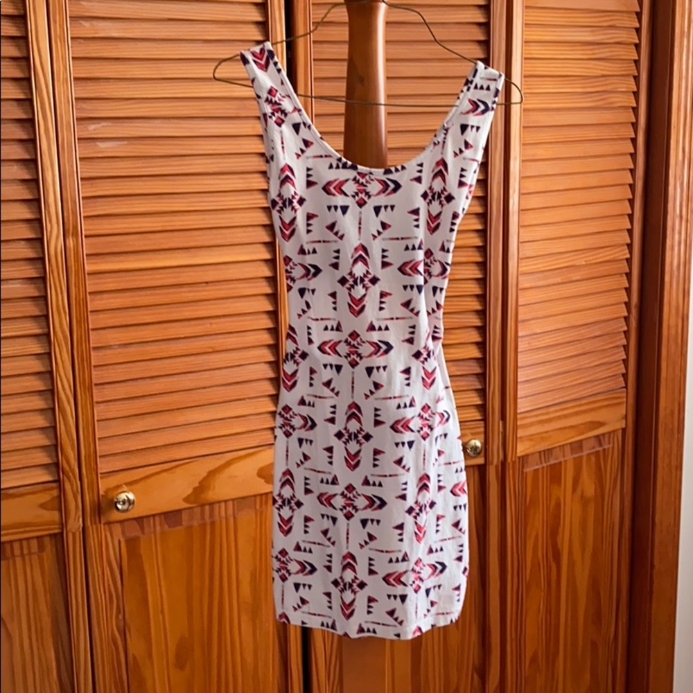 White dress with pink and purple geometric pattern